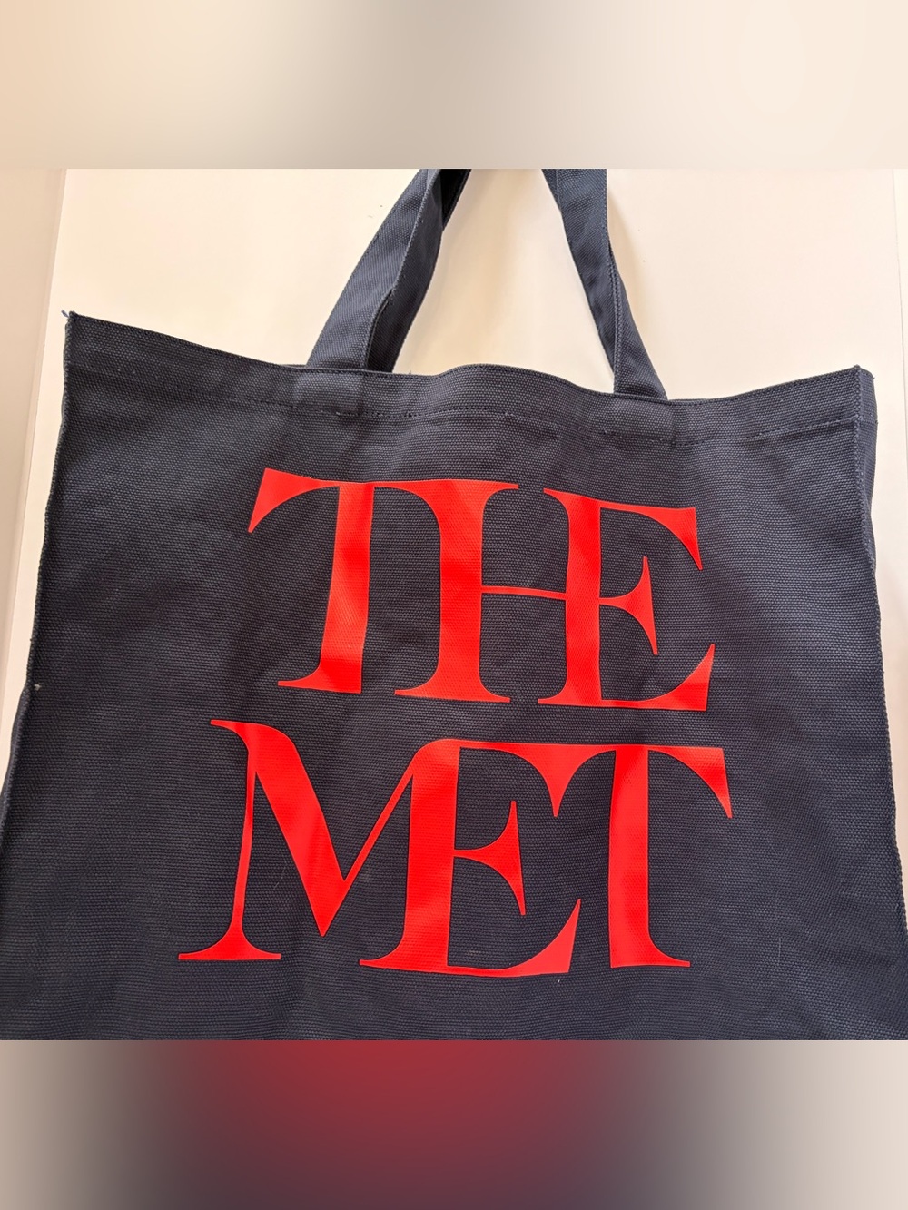 THE MET Black Canvas Duffel Tote with Red Logo